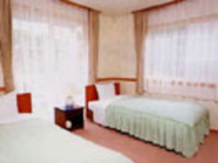 洋室　ツインのお部屋にエキストラベッドで3名様